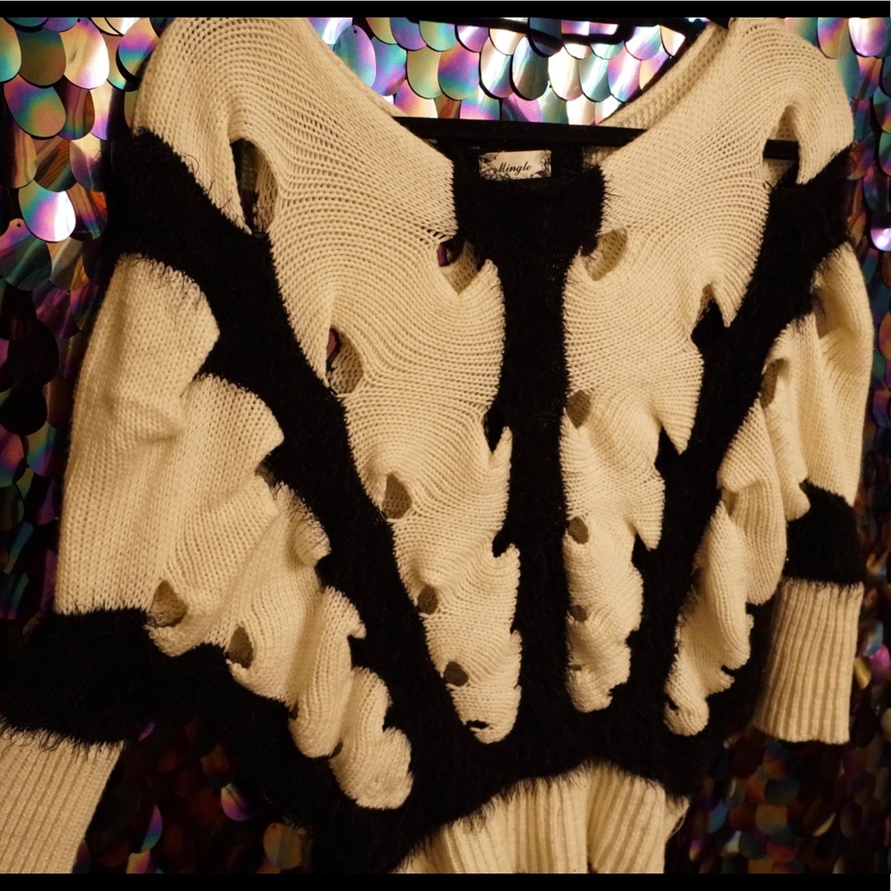 Kitted dolmain sleeved sweater